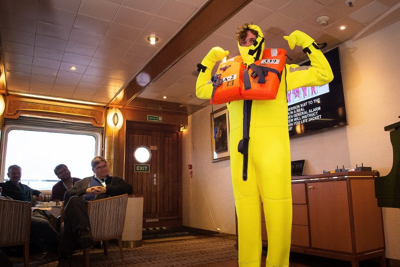 guest enjoying the welcome champagne toast in the lounge